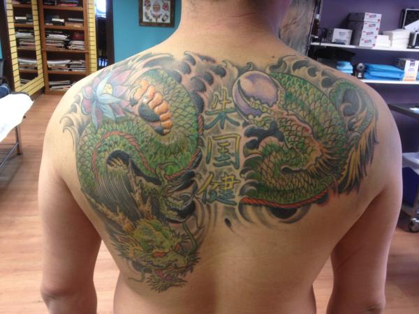 9. Dragon Shoulder Blade Tattoo - wide 2